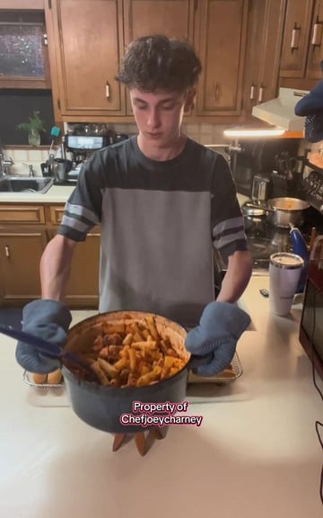 Cooking dinner for my family: Chicken marinara pasta with garlic breadsticks. (My mom…